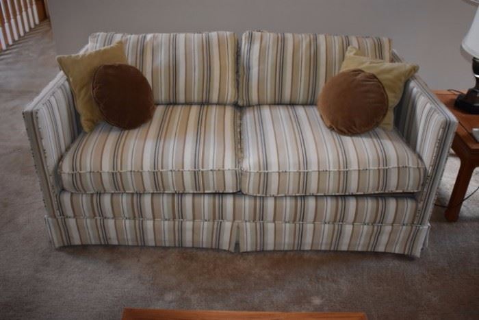 Beautifully Upholstered Stripped Sofa with Throw Pillows