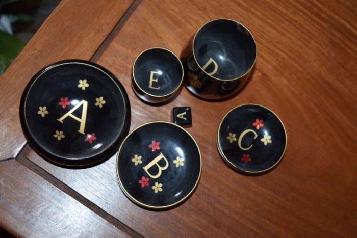 Lacquerware Game using one die and various size bowls