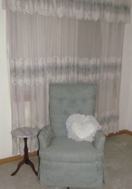 Blue Brocade Upholstered Swivel Rocker shown with a small Marble Top Pedestal Splatted Legs Mahogany Plant Stand/Side Table