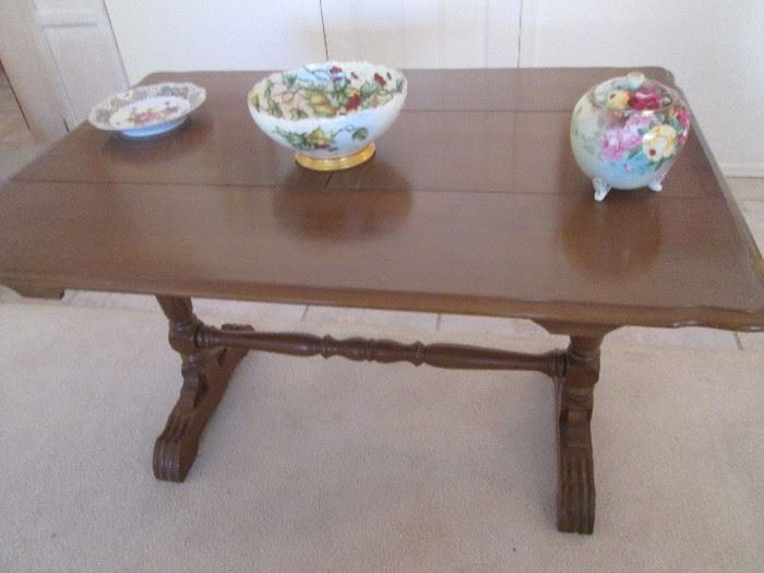 Versatile Trestle Table.  Can be used as a console table or side leaves pull out and form the square as shown