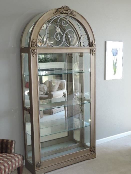 this curio -cabinet will hold the art-glass that we need to unpack - this cabinet is priced at $285.00