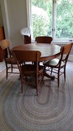 Antique claw foot kitchen table with leaf and 4 chairs