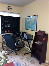 Desk, electronics, and office supplies
