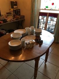 Oak drop leaf table and wedgewood "platinum twist" china