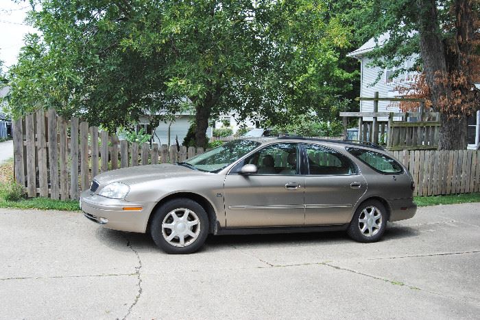 2003 Mercury Sable. 77,000 miles. 24 valve dual overhead camshafts. Has small oil leak-we have an estimate for repair from Gear Heads Garage and will subtract that amount from Blue Book value.