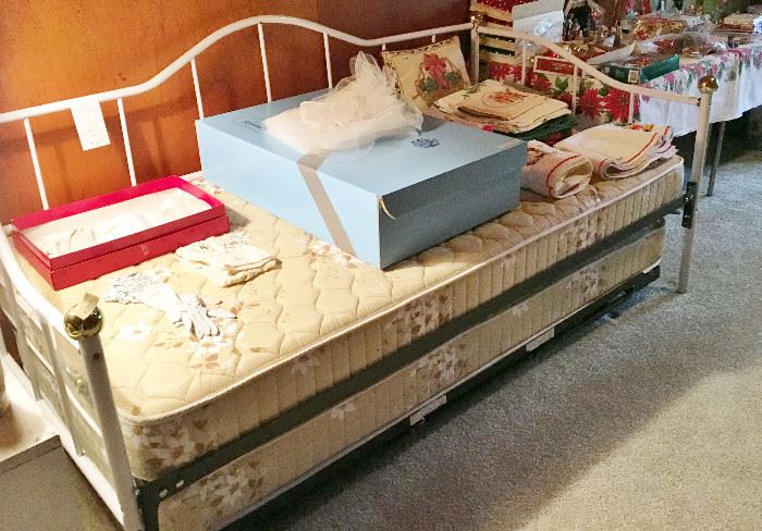 Nice trundle bed and a wedding dress and veil from the 1980s