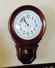 Howard Miller Regulator Clock, with key and pendulum