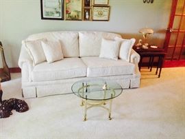Ivory Schweiger Sofa - SUPER CLEAN; glass and brass side table; large ceramic floor dog; Pair of wood glass nesting tables;  Pretty glass & brass lamp