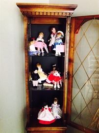 Collection of Madame Alexander Dolls with Boxes; Display Cabinet