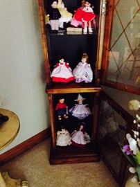 Collection of Madame Alexander Dolls with Boxes; display cabinet