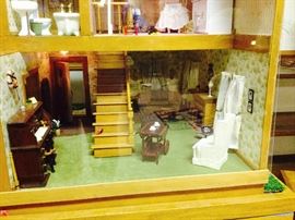 Amazing Dollhouse COMPLETED. It spins around on table.  MUST SEE TO APPRECIATE.  This is a wonderful piece!