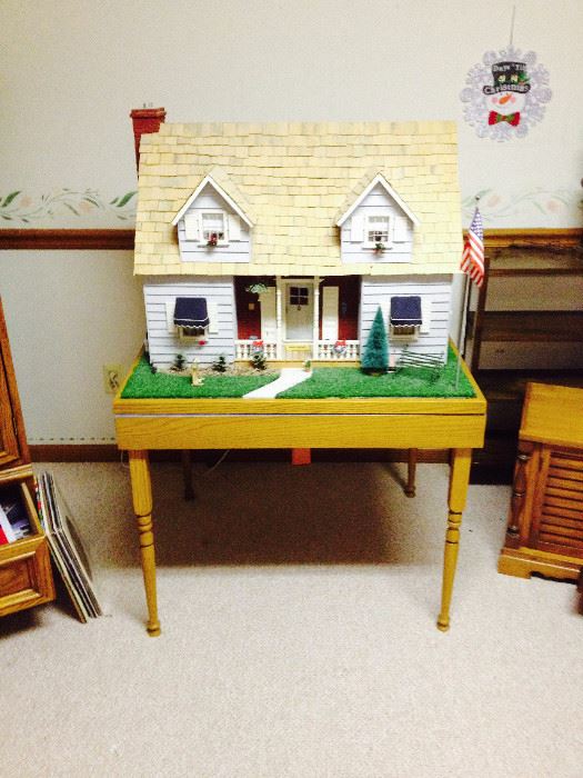 Amazing Dollhouse COMPLETED. It spins around on table.  MUST SEE TO APPRECIATE.  This is a wonderful piece!