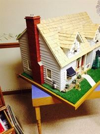 Amazing Dollhouse COMPLETED. It spins around on table.  MUST SEE TO APPRECIATE.  This is a wonderful piece!