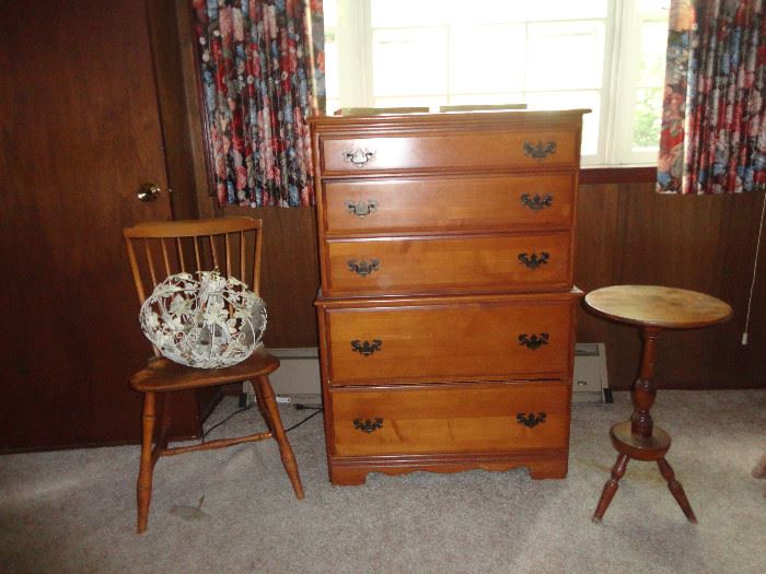 Vintage Italian light fixture - a nice antique chest of drawers and a small lamp table.