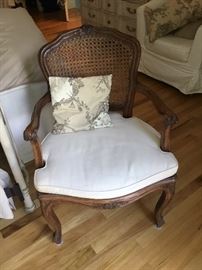 One of two caned armchairs, one need caning seat redone, 