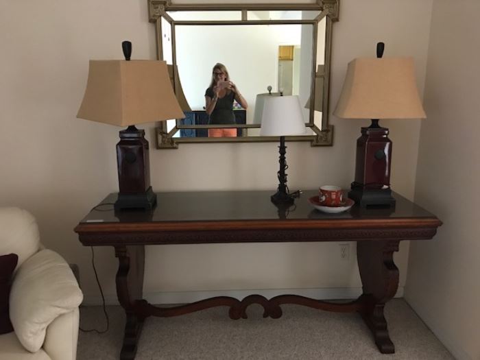Long antique table came from Chicago hotel. Pair of Oriental style new lamps, Mirror.
