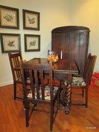Beautiful pub table with barley twist legs and wardrobe with shelves and drawers. Pictures on wall in this picture are not for sale.