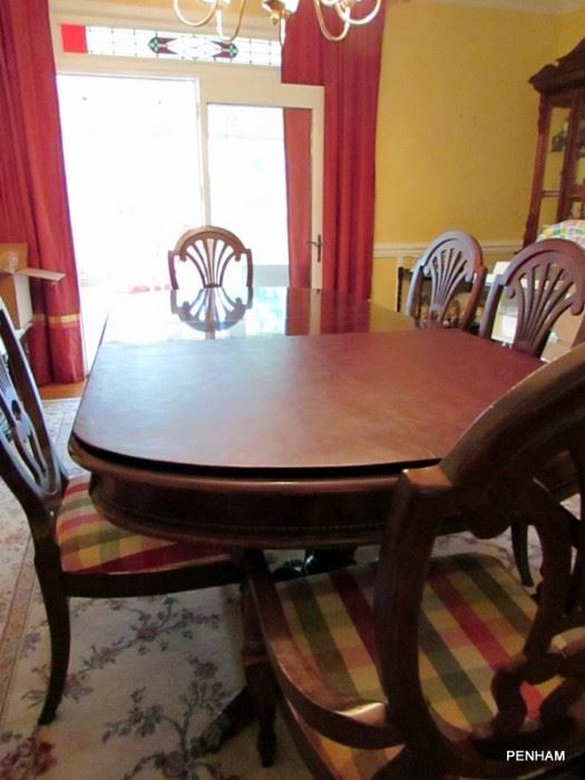 Table with 6 chairs and table pad.