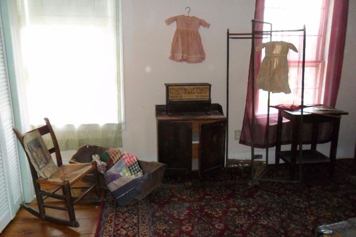Antique Rocker,Antique washstand,Antique Primitive Wooden Cradle,Antique Children's Dresses(Circa mid 1800's) Antique Screen,etc...