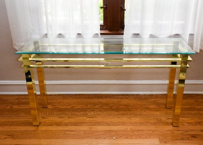 BUY IT NOW!  Lot # 110, Brass Console Table with Glass Top, $200. (Approx. 52" L x 16" W x 28" H)