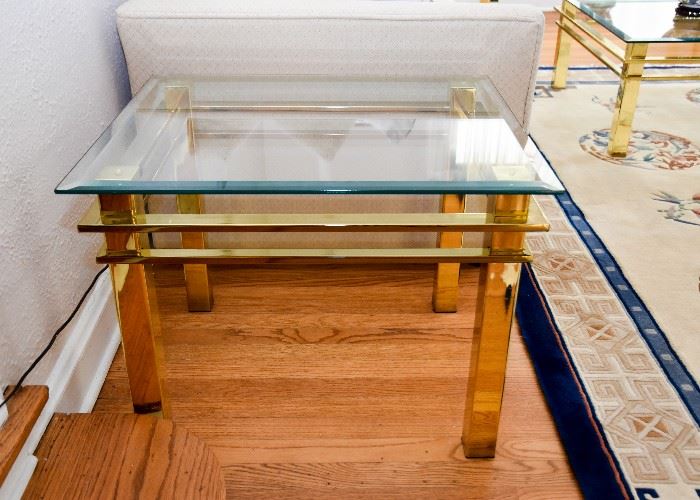 BUY IT NOW!  Lot # 109, Brass End Table with Glass Top, $125. (Approx. 27" L x 23" W x 20.5" H)