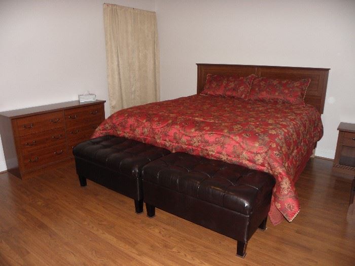 King size mattress and box spring.  Black leather type tufted storage foot stools.  Dresser, two night stands