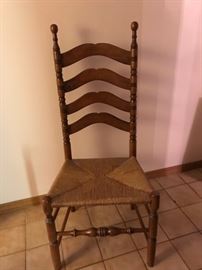 One of two rush seat chairs