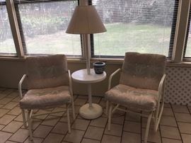 Two gliders and outdoor floor lamp