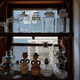 Apothecary & storage jars, figural decanters, oil lamps