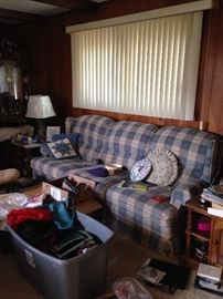 Couch with recliner also has matching swivel rocker.