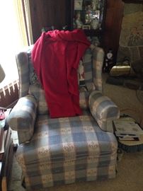 The matching chair swivels and rotates.