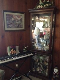 One of two curio cabinets filled with collectibles!
