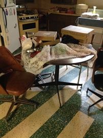 Mid Century round table with 3 swivel chairs 2 match and one doesn't!