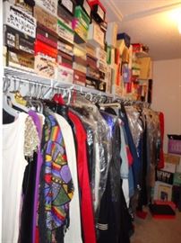 hundreds of designer shoes, clothes and purses.  This is one pictures of 11 closets.