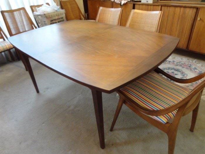 Glenn of California teak Dinging room table with teak chairs 3 leaves and pads