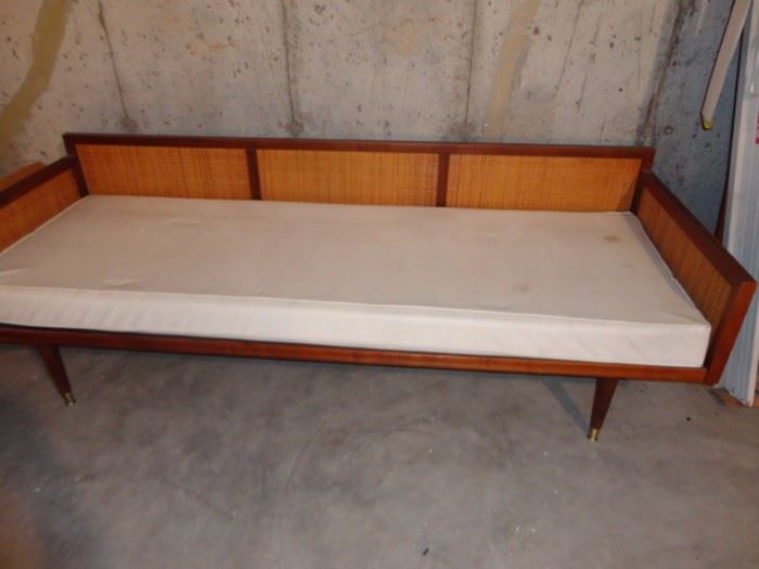 totally mid century modern couch with cane back