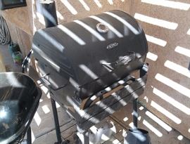 Smoker and charcoal pit.