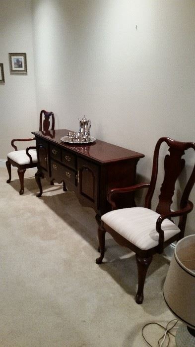 Side board, 2 captain's chairs, small silverplate coffee service.