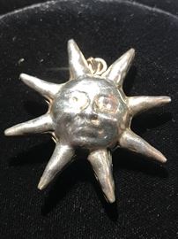 Sterling silver sunburst pendant