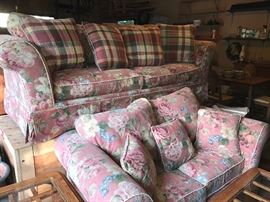 Upholstered floral print sofa and matching love seat
