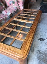 Glass top coffee table with design (there are two matching end tables)