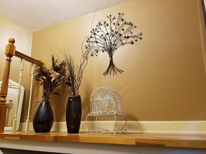 vases and bird cage wall decor