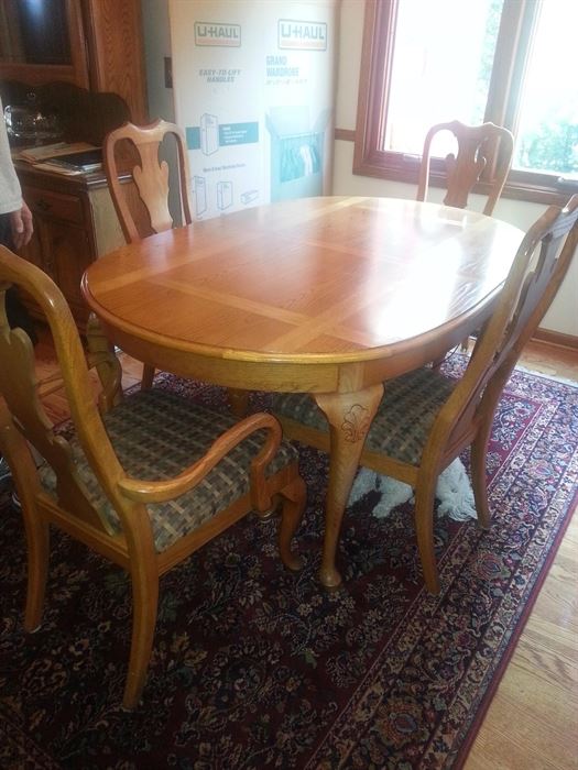 Thomasville oak table with six chairs and two leaves