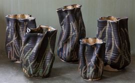 Uniquely shaped flower vases.