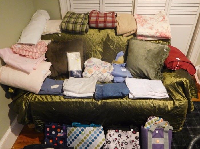 Linens including sheets, pillows, pillowcases, down comforter, futon cover, lunchboxes and more