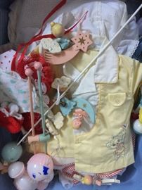 Vintage baby clothes and toys
