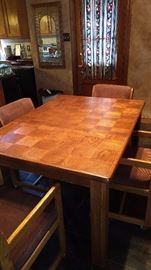 Oak Dining table with 1 leaf and 4 arm chairs on casters $350 