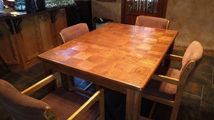 Dining table with one leaf and 4 chairs on casters $350