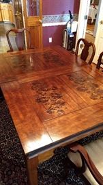 Beautiful Dining Table with 2 leaves. 4 chairs and 2 arm chairs. Pristine condtion $1000