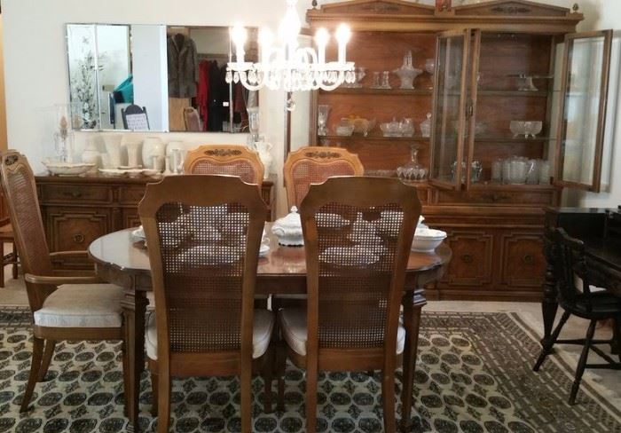 Dining room furniture includes table with 2 leaves, lighting china cabinet, buffet